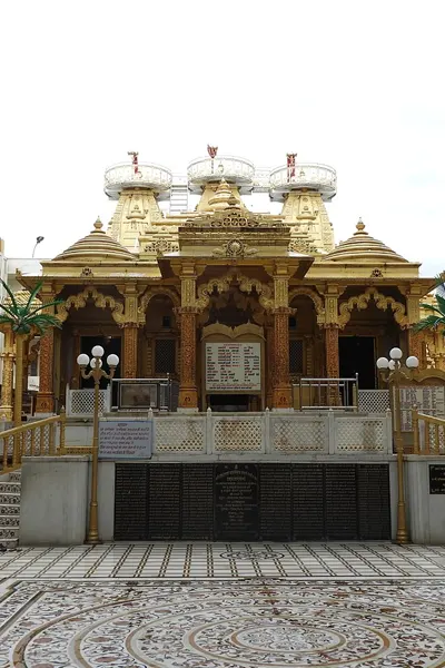 The ornate golden architecture of the Falna Jain Temple, a revered pilgrimage destination on the Abu Road to Falna taxi journey.