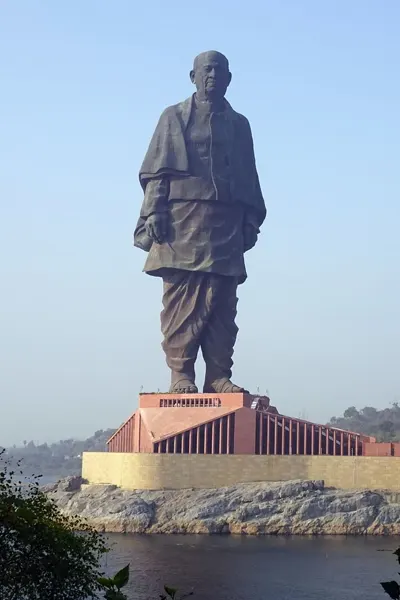 The towering Statue of Unity against a clear sky, the world's tallest statue and a key attraction on the Abu Road to Vadodara taxi route.